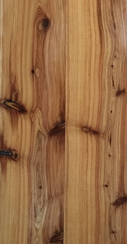 Australian Cypress flooring has beautiful figurative grain and dark brown knots. ©